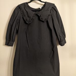 AND NOW THIS exaggerated collar dress